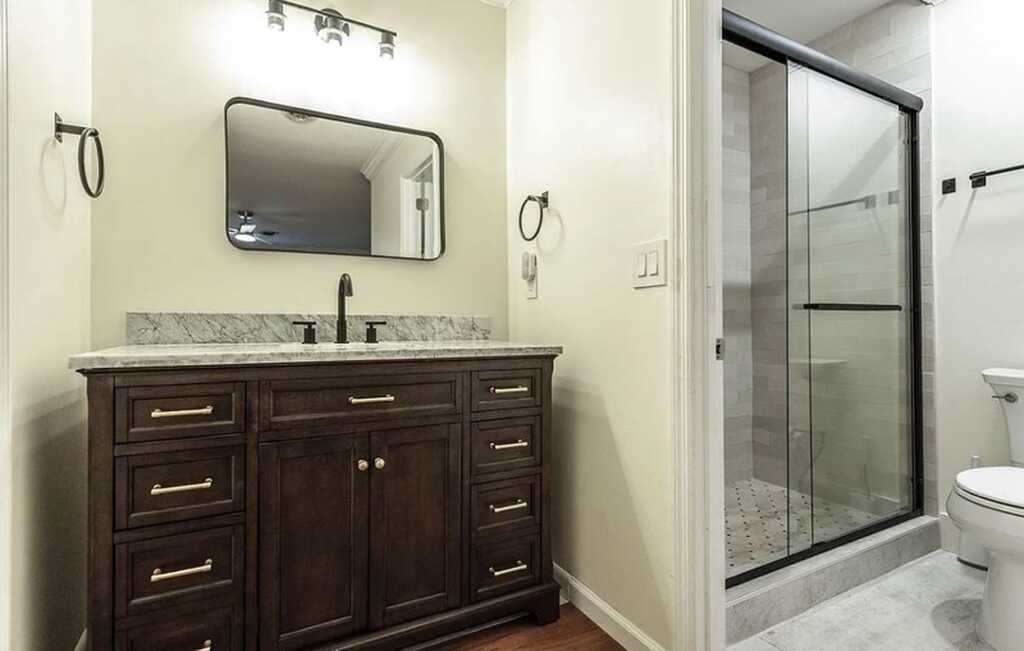 Bathroom vanity and glass shower remodel by Doty Remodeling Services
